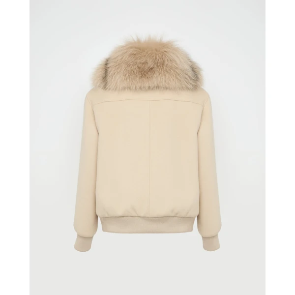 Woman wearing Yves Salomon shearling fur coat – luxury outerwear at Luxury Shoes 