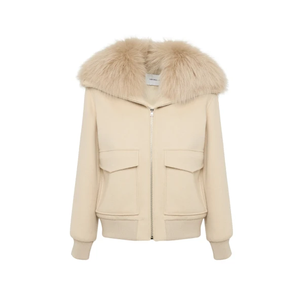 Woman wearing Yves Salomon shearling fur coat – luxury outerwear at Luxury Shoes 