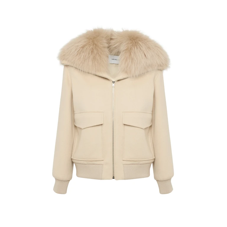 Woman wearing Yves Salomon shearling fur coat – luxury outerwear at Luxury Shoes 
