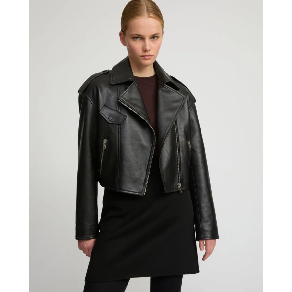 Woman wearing Yves Salomon shearling fur coat – luxury outerwear at Luxury Shoes 