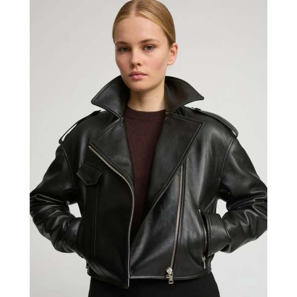 Woman wearing Yves Salomon shearling fur coat – luxury outerwear at Luxury Shoes 