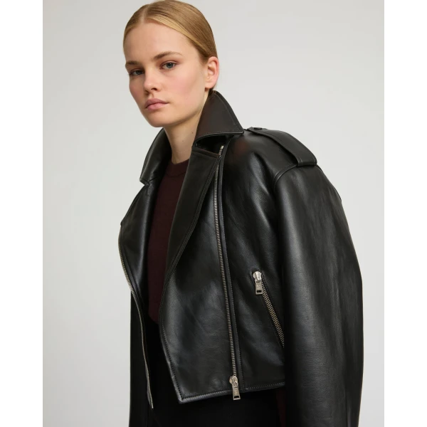 Woman wearing Yves Salomon shearling fur coat – luxury outerwear at Luxury Shoes 