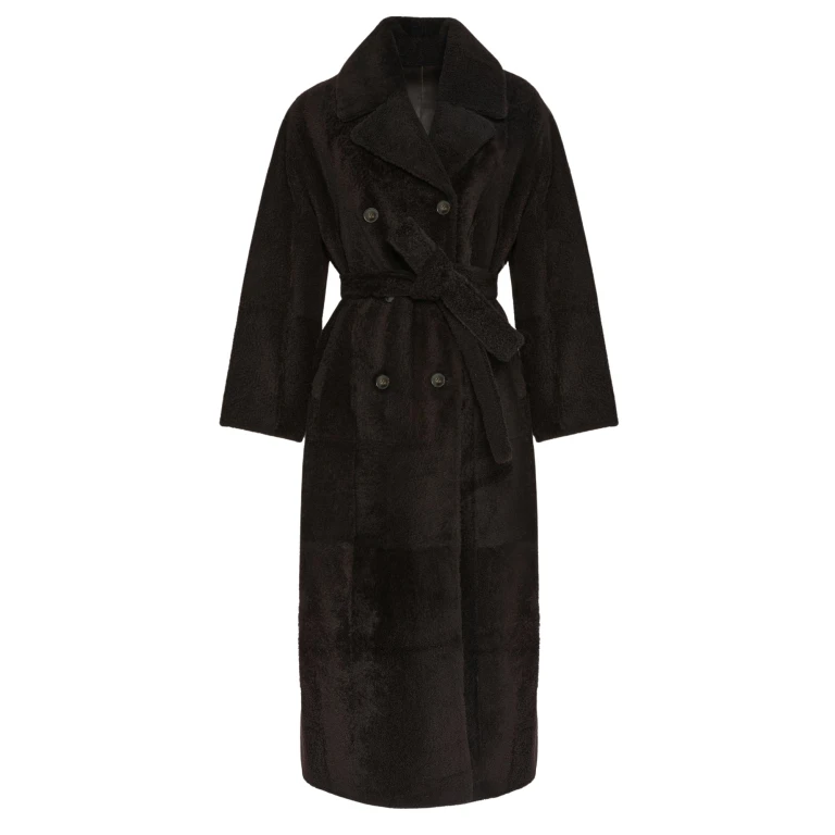 Woman wearing Yves Salomon shearling fur coat – luxury outerwear at Luxury Shoes 