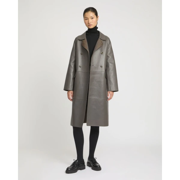 Woman wearing Yves Salomon shearling fur coat – luxury outerwear at Luxury Shoes 