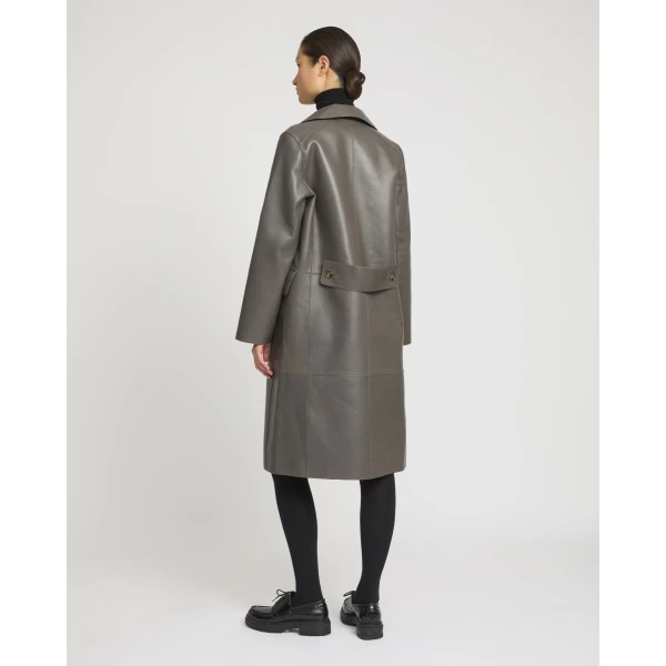 Woman wearing Yves Salomon shearling fur coat – luxury outerwear at Luxury Shoes 