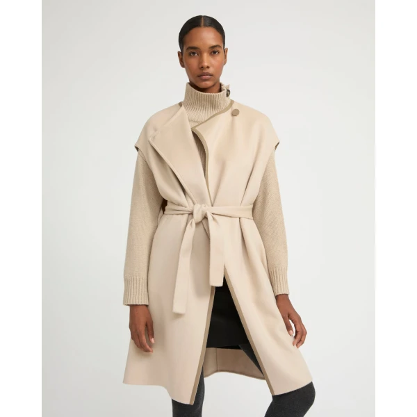 Woman wearing Yves Salomon shearling fur coat – luxury outerwear at Luxury Shoes 