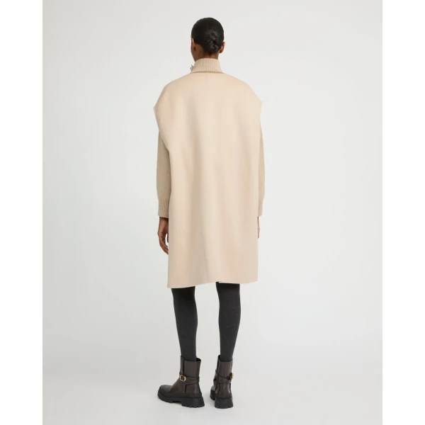 Woman wearing Yves Salomon shearling fur coat – luxury outerwear at Luxury Shoes 