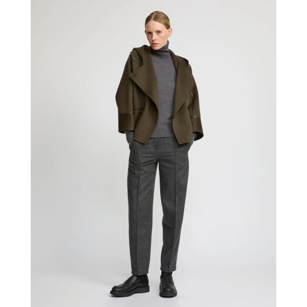 Woman wearing Yves Salomon shearling fur coat – luxury outerwear at Luxury Shoes 