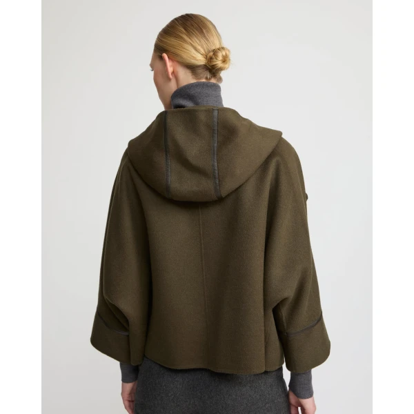 Woman wearing Yves Salomon shearling fur coat – luxury outerwear at Luxury Shoes 