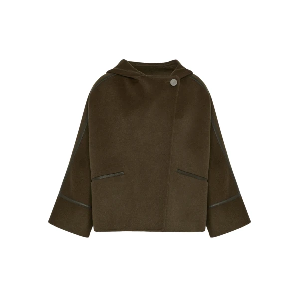 Woman wearing Yves Salomon shearling fur coat – luxury outerwear at Luxury Shoes 