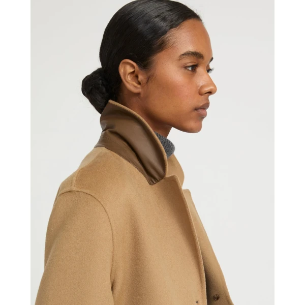 Woman wearing Yves Salomon shearling fur coat – luxury outerwear at Luxury Shoes 