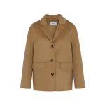 Woman wearing Yves Salomon shearling fur coat – luxury outerwear at Luxury Shoes 