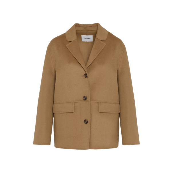 Woman wearing Yves Salomon shearling fur coat – luxury outerwear at Luxury Shoes 