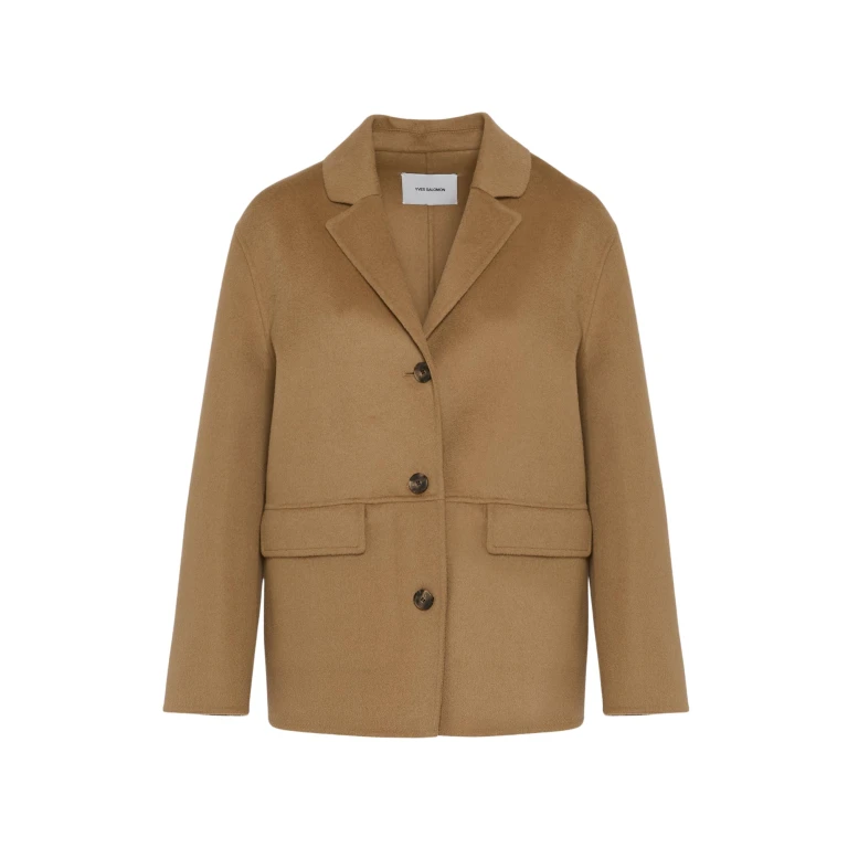 Woman wearing Yves Salomon shearling fur coat – luxury outerwear at Luxury Shoes 