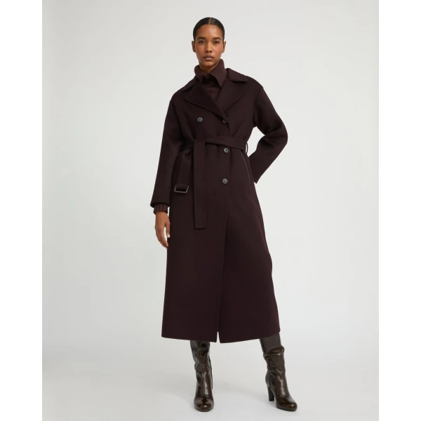 Woman wearing Yves Salomon shearling fur coat – luxury outerwear at Luxury Shoes 