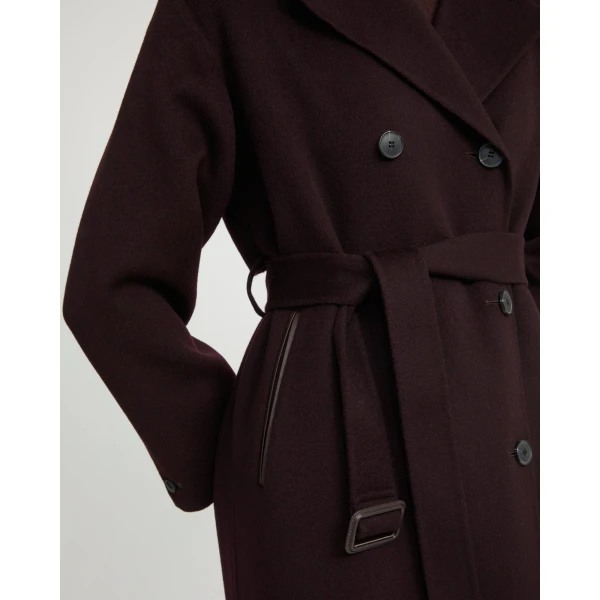 Woman wearing Yves Salomon shearling fur coat – luxury outerwear at Luxury Shoes 
