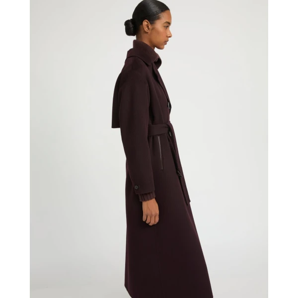 Woman wearing Yves Salomon shearling fur coat – luxury outerwear at Luxury Shoes 