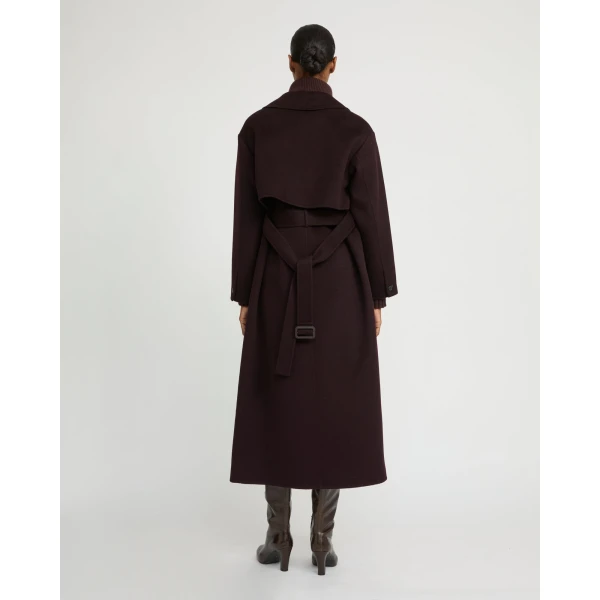 Woman wearing Yves Salomon shearling fur coat – luxury outerwear at Luxury Shoes 