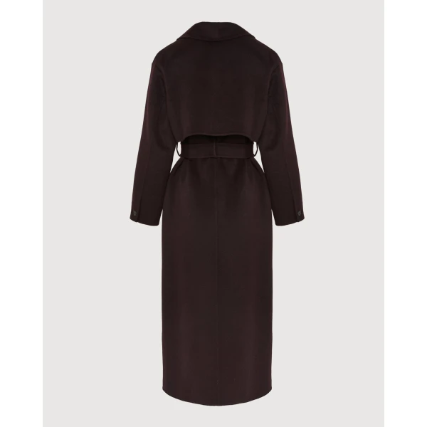 Woman wearing Yves Salomon shearling fur coat – luxury outerwear at Luxury Shoes 