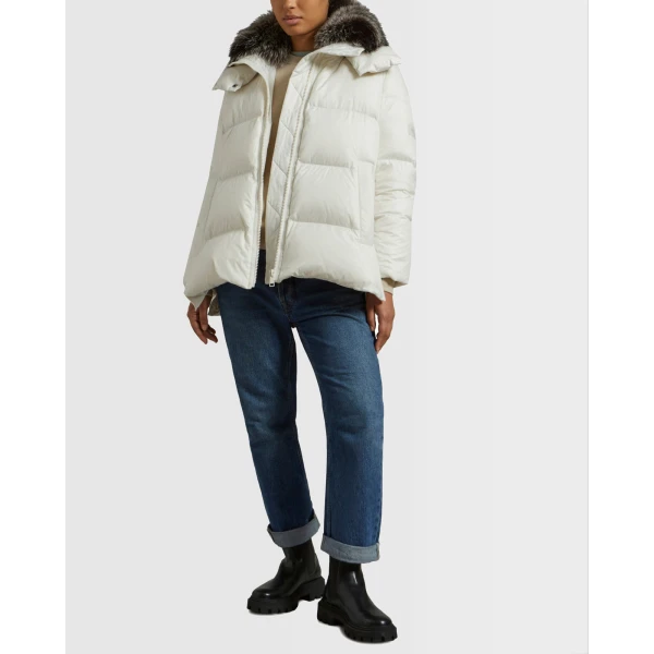 Woman wearing Yves Salomon shearling fur coat – luxury outerwear at Luxury Shoes 