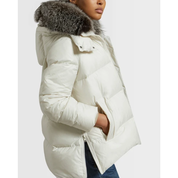 Woman wearing Yves Salomon shearling fur coat – luxury outerwear at Luxury Shoes 