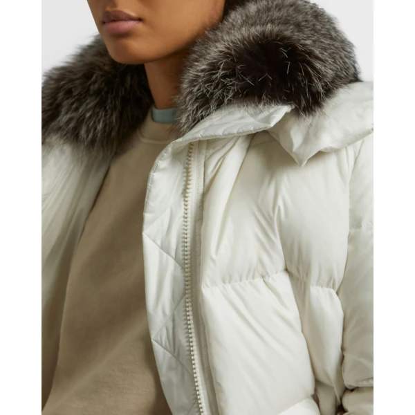 Woman wearing Yves Salomon shearling fur coat – luxury outerwear at Luxury Shoes 