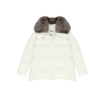 Woman wearing Yves Salomon shearling fur coat – luxury outerwear at Luxury Shoes 