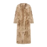 Woman wearing Yves Salomon shearling fur coat – luxury outerwear at Luxury Shoes 