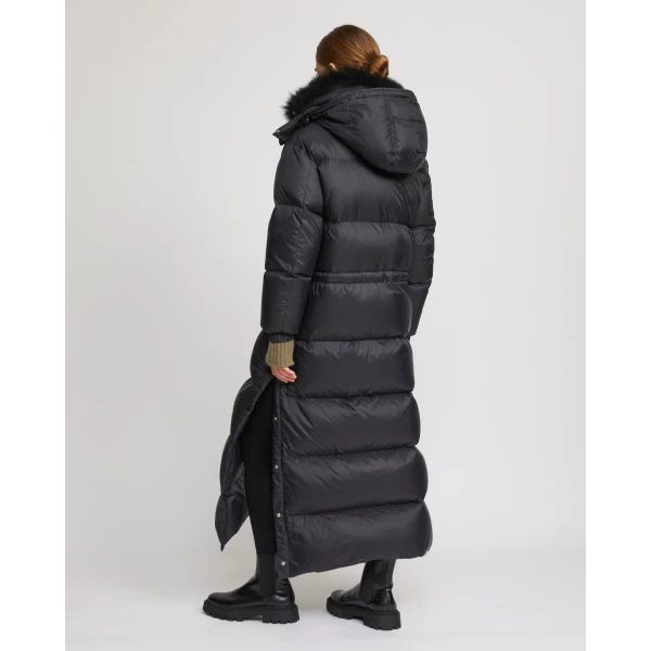 Woman wearing Yves Salomon shearling fur coat – luxury outerwear at Luxury Shoes 