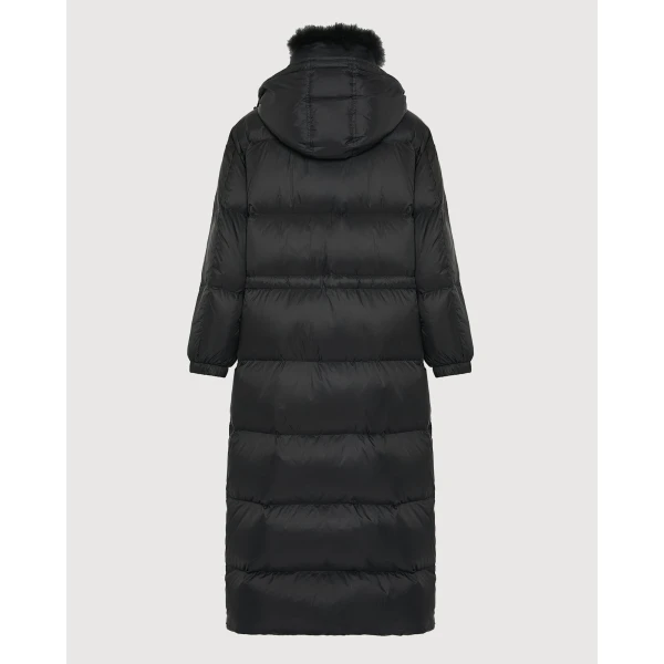 Woman wearing Yves Salomon shearling fur coat – luxury outerwear at Luxury Shoes 