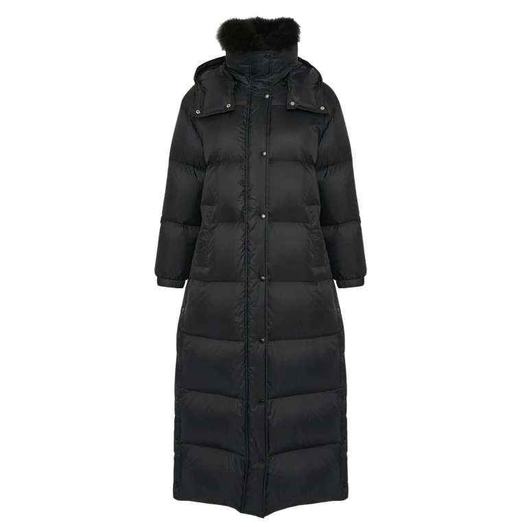 Woman wearing Yves Salomon shearling fur coat – luxury outerwear at Luxury Shoes 