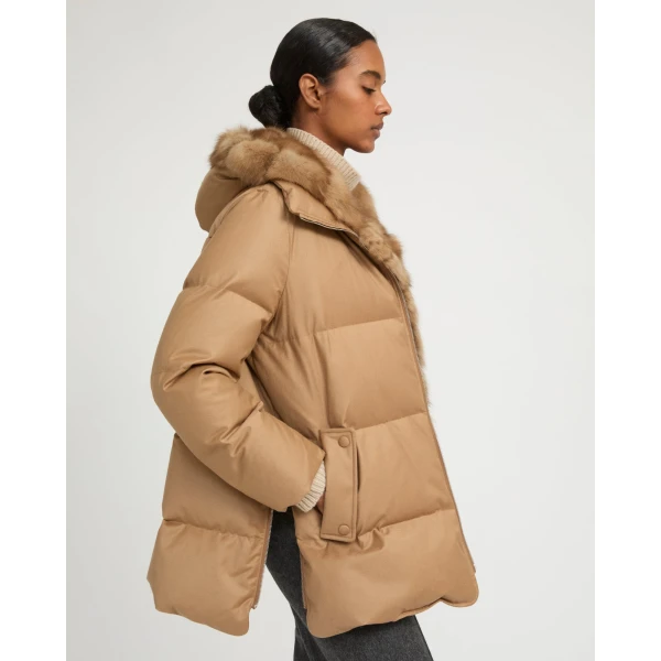 Woman wearing Yves Salomon shearling fur coat – luxury outerwear at Luxury Shoes 