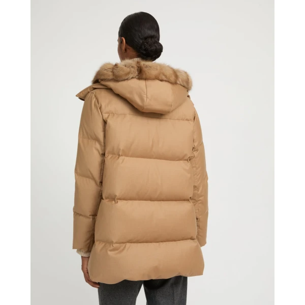Woman wearing Yves Salomon shearling fur coat – luxury outerwear at Luxury Shoes 