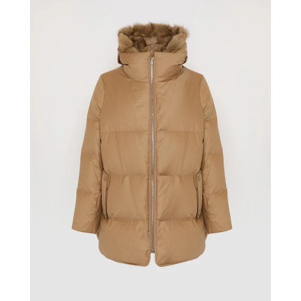 Woman wearing Yves Salomon shearling fur coat – luxury outerwear at Luxury Shoes 