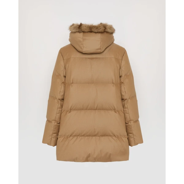 Woman wearing Yves Salomon shearling fur coat – luxury outerwear at Luxury Shoes 