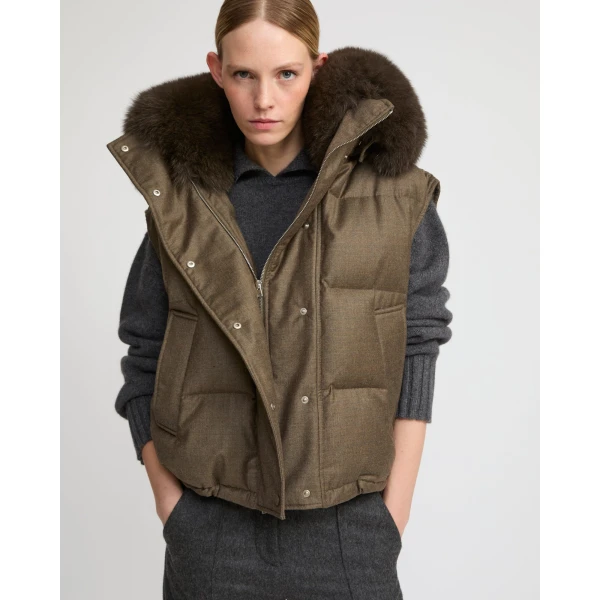Woman wearing Yves Salomon shearling fur coat – luxury outerwear at Luxury Shoes 