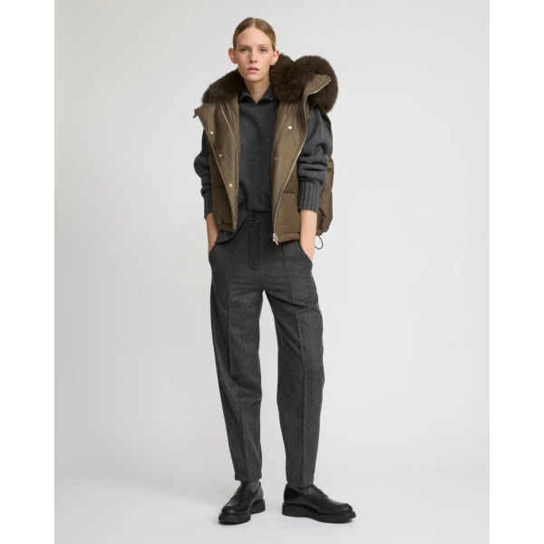 Woman wearing Yves Salomon shearling fur coat – luxury outerwear at Luxury Shoes 