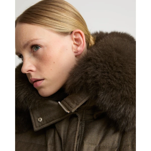 Woman wearing Yves Salomon shearling fur coat – luxury outerwear at Luxury Shoes 