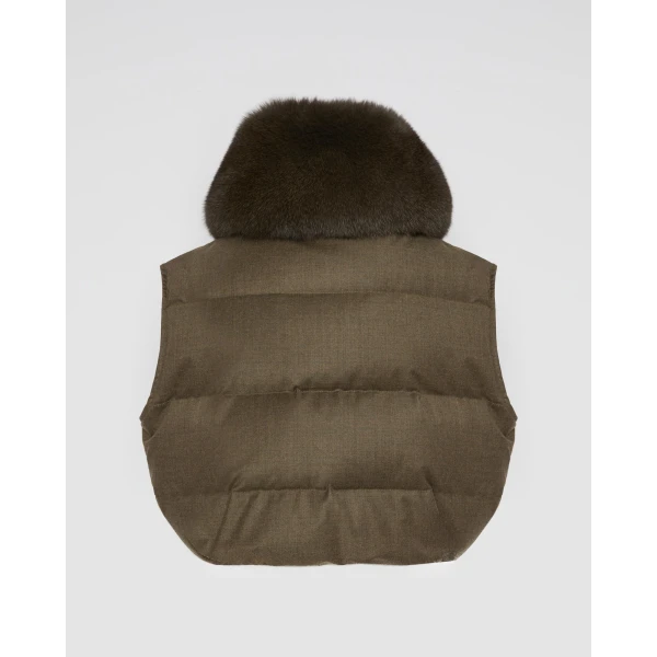 Woman wearing Yves Salomon shearling fur coat – luxury outerwear at Luxury Shoes 