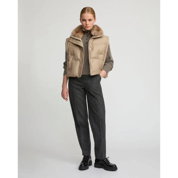 Woman wearing Yves Salomon shearling fur coat – luxury outerwear at Luxury Shoes 