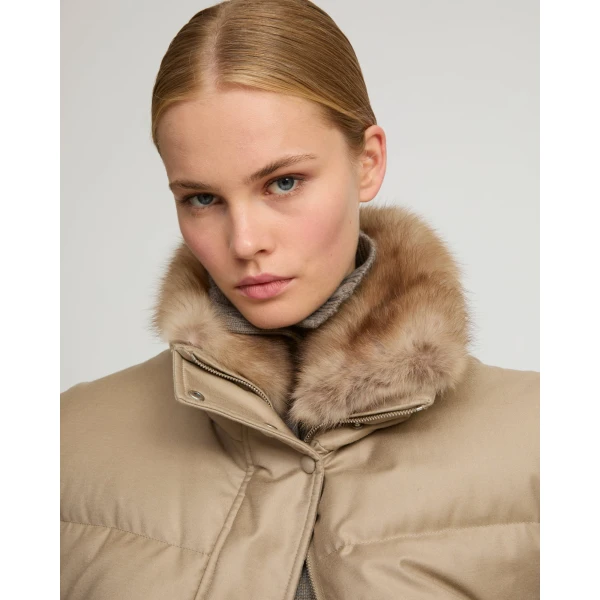 Woman wearing Yves Salomon shearling fur coat – luxury outerwear at Luxury Shoes 