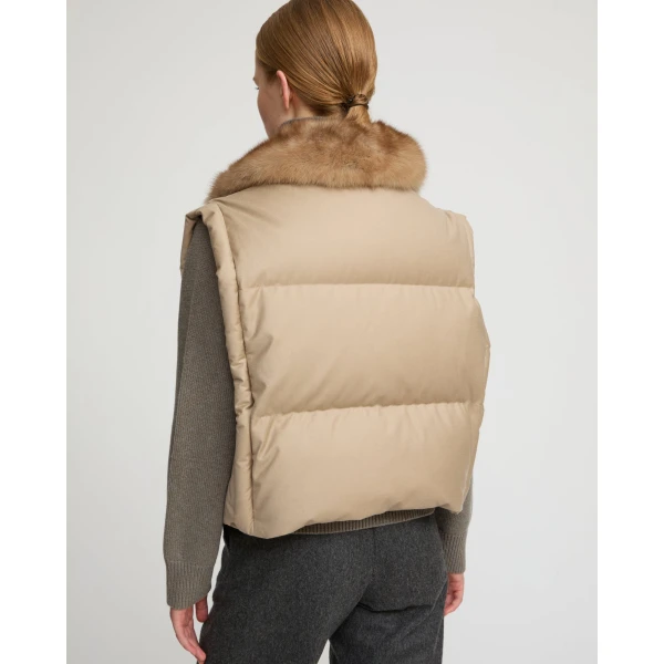 Woman wearing Yves Salomon shearling fur coat – luxury outerwear at Luxury Shoes 