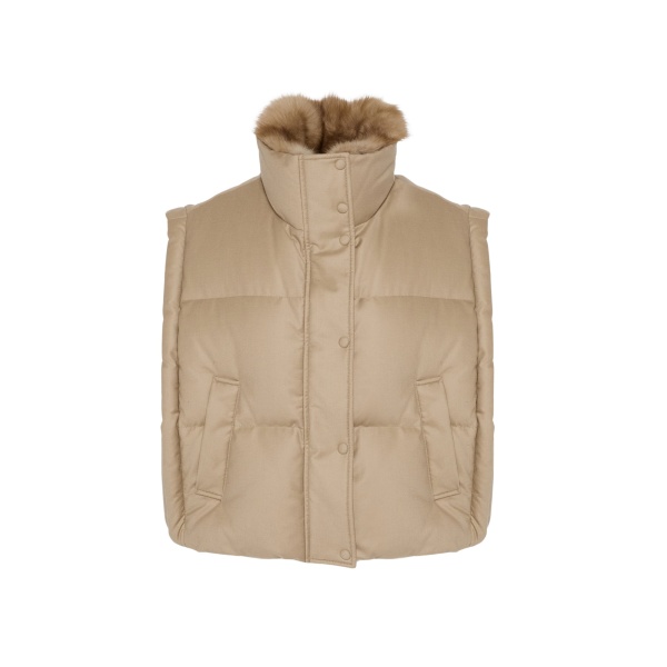 Woman wearing Yves Salomon shearling fur coat – luxury outerwear at Luxury Shoes 