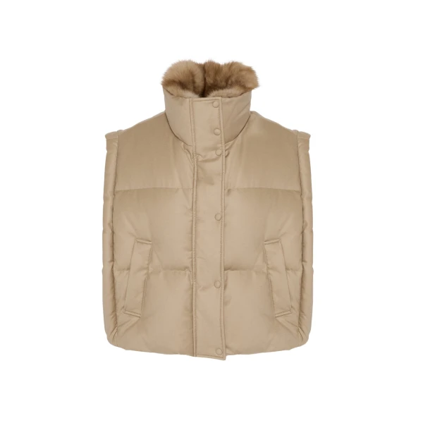Woman wearing Yves Salomon shearling fur coat – luxury outerwear at Luxury Shoes 