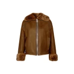 Woman wearing Yves Salomon shearling fur coat – luxury outerwear at Luxury Shoes 