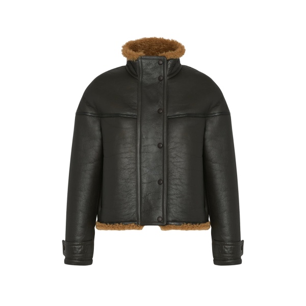 Woman wearing Yves Salomon shearling fur coat – luxury outerwear at Luxury Shoes 