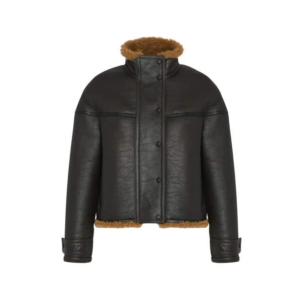 Woman wearing Yves Salomon shearling fur coat – luxury outerwear at Luxury Shoes 