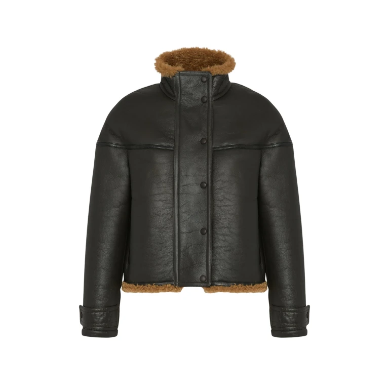 Woman wearing Yves Salomon shearling fur coat – luxury outerwear at Luxury Shoes 