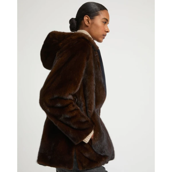 Woman wearing Yves Salomon shearling fur coat – luxury outerwear at Luxury Shoes 
