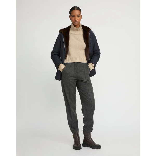 Woman wearing Yves Salomon shearling fur coat – luxury outerwear at Luxury Shoes 